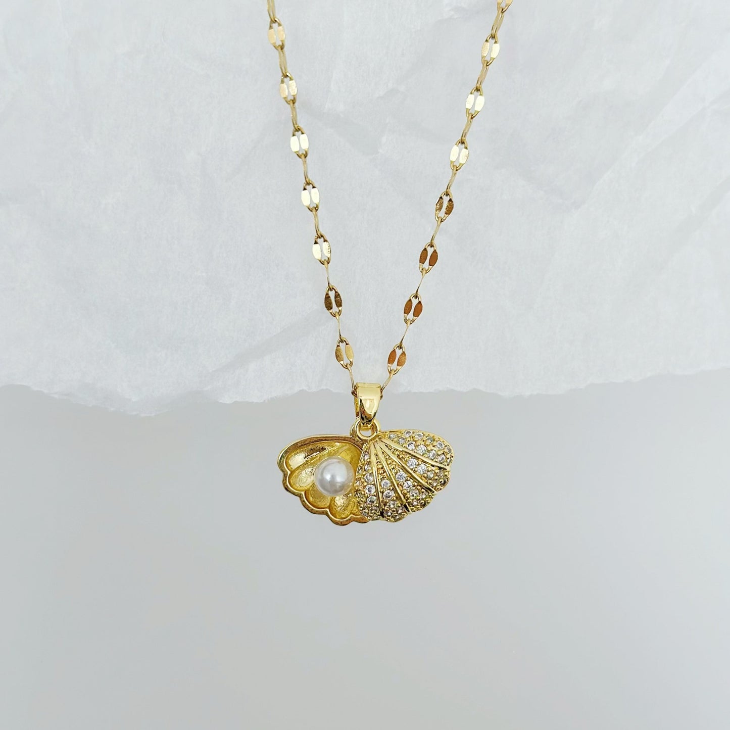 gold seashell necklace with pearl