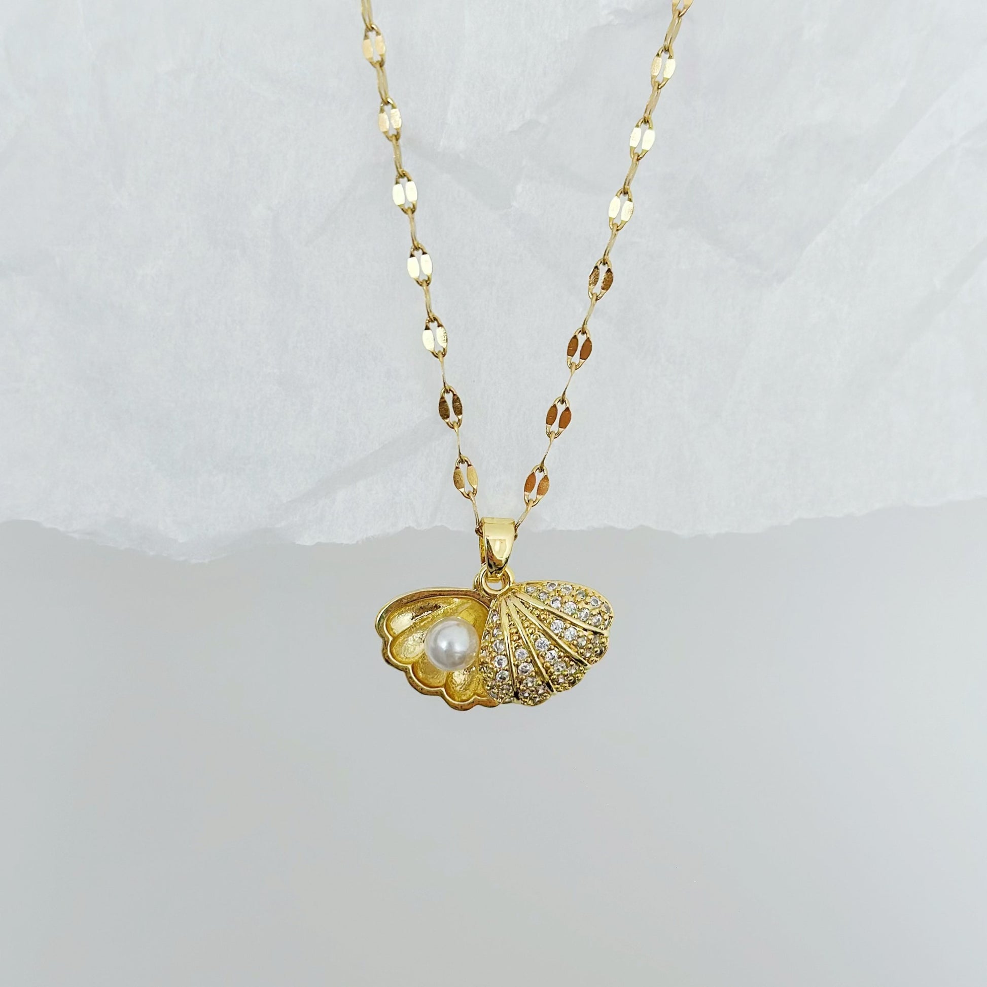 gold seashell necklace with pearl