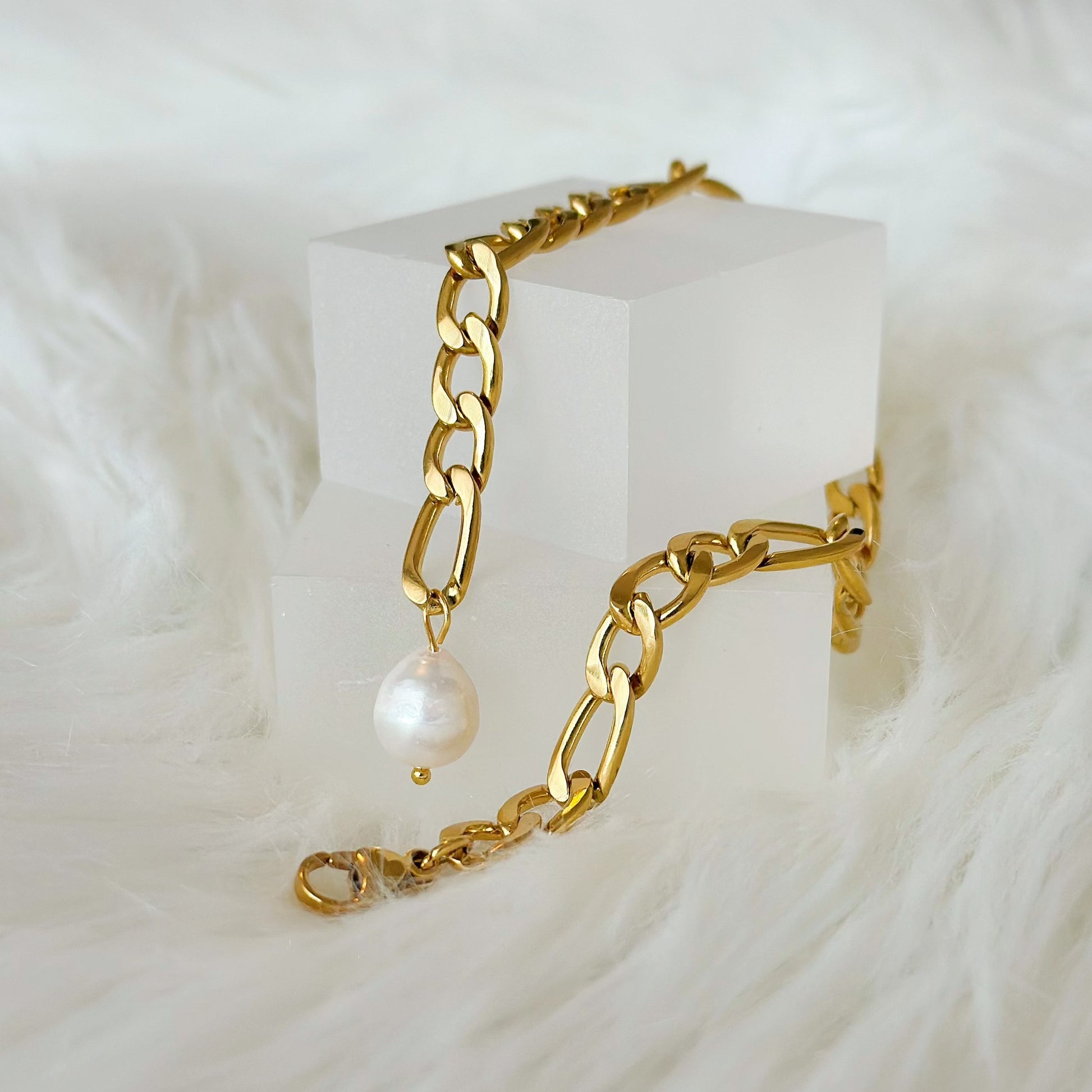 chunky gold bracelet with pearl drop