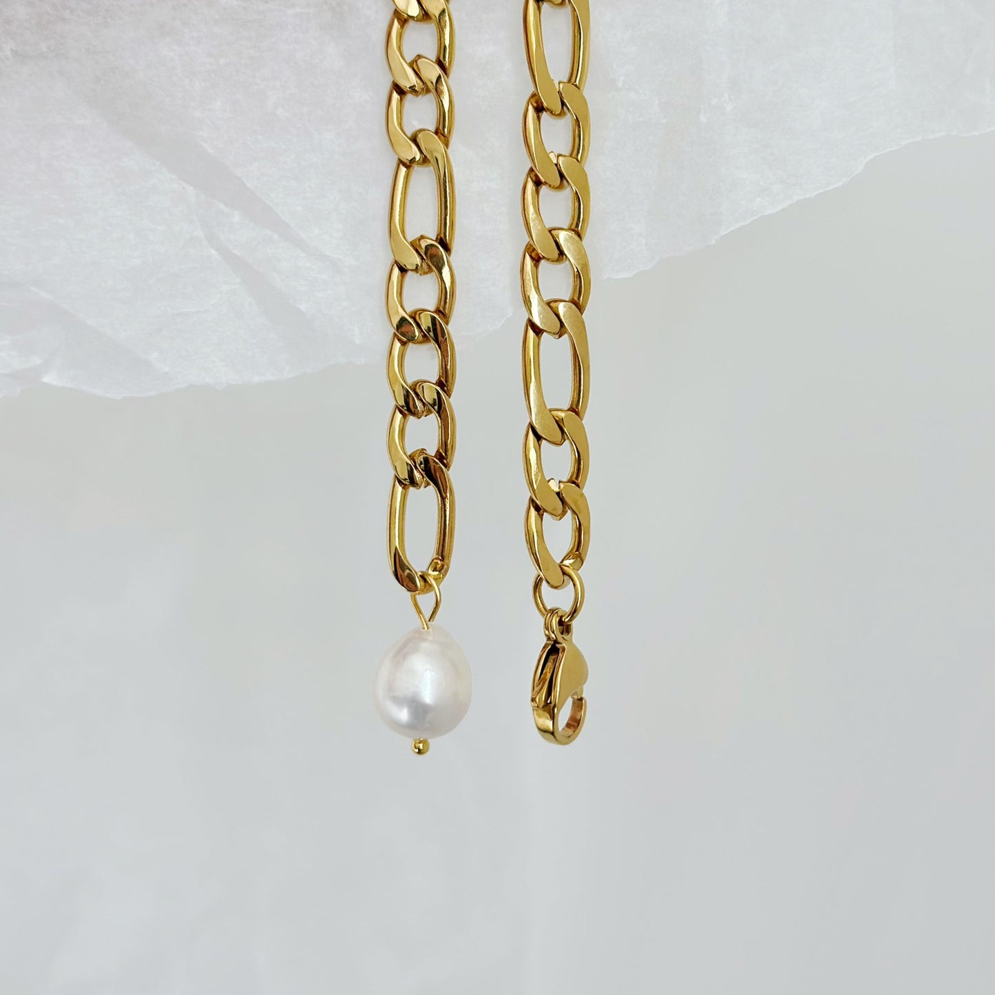 chunky gold bracelet with pearl drop