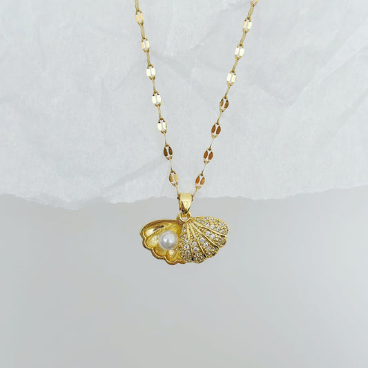 gold seashell necklace with pearl