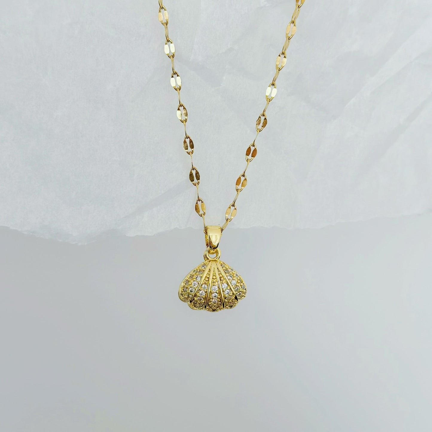 gold seashell necklace with pearl